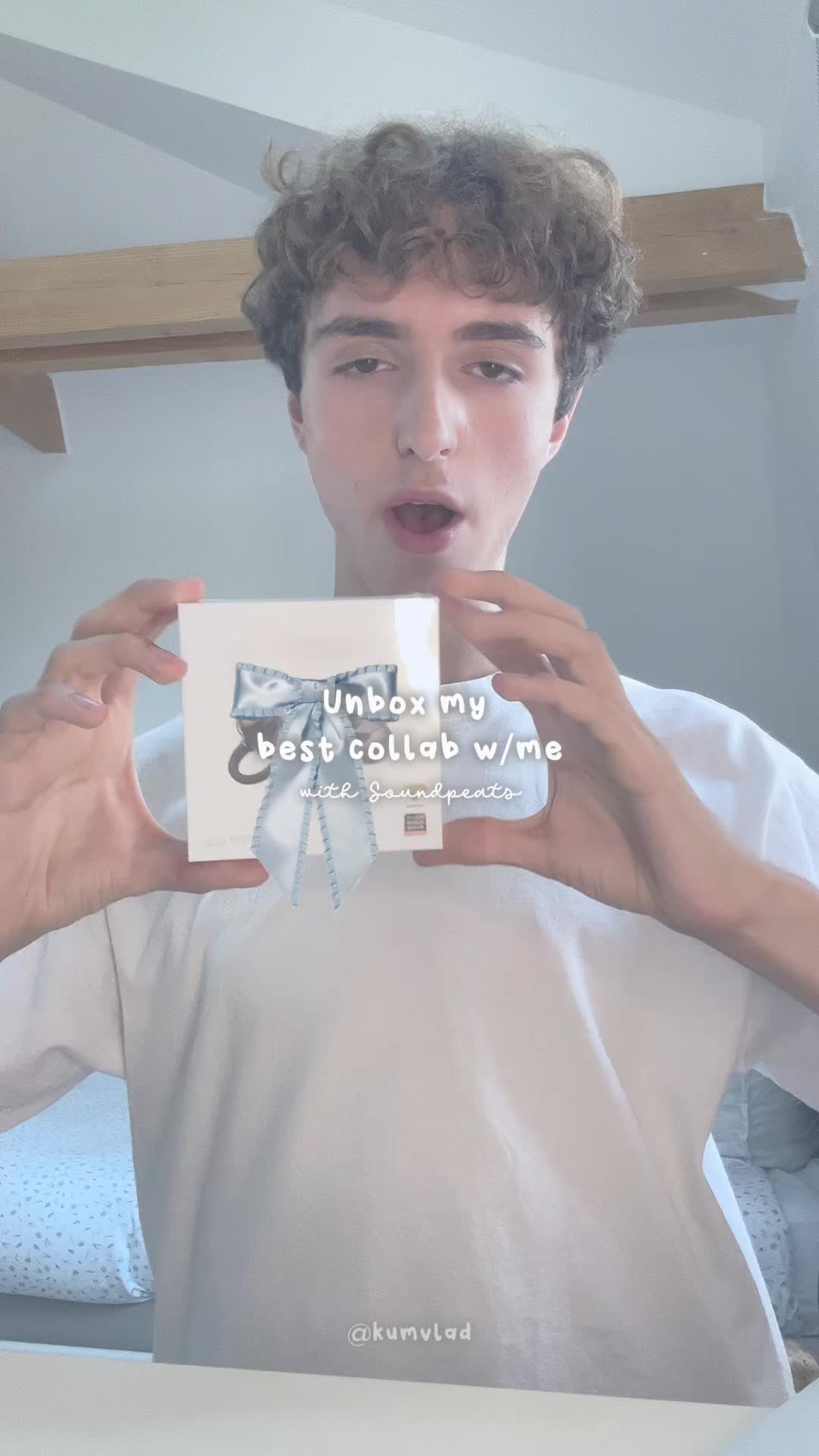 TikTok post by @kumvlad for SOUNDPEATS. Caption reads: This is the biggest collab I ever got @SOUNDPEATS....