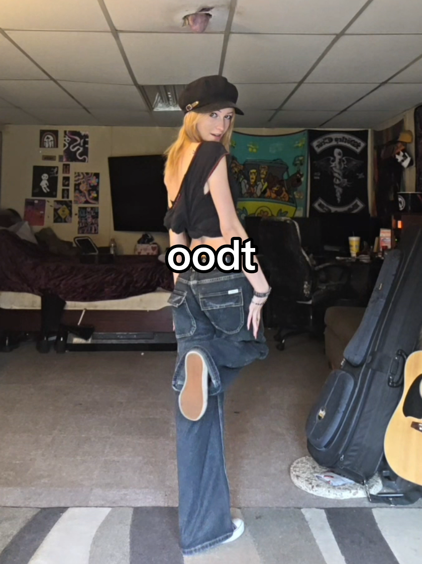 TikTok post by @rosie.rhine for Emmiol. Caption reads: [...] this outfit is the epitome of me @EMMIOL....