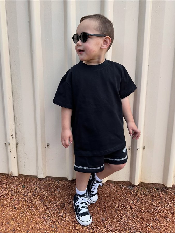 Instagram post by @metier.social for Polarised Baby Sunglasses. Caption reads: • Keeping little eyes safe & stylish with....