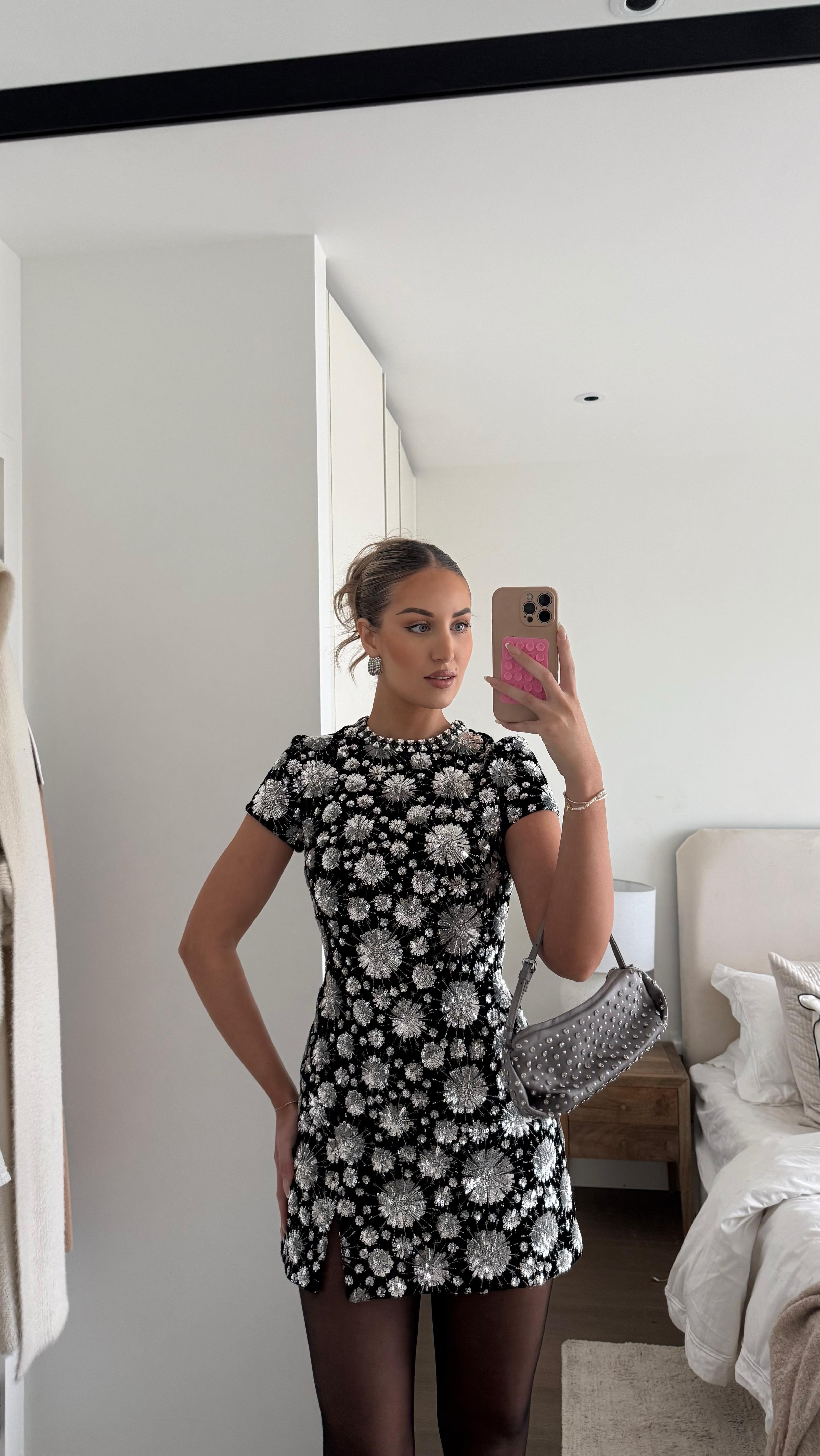 Instagram post by @katherine_bondd for Nadine Merabi. Caption reads: When the designers a woman, you can just tell…✨....