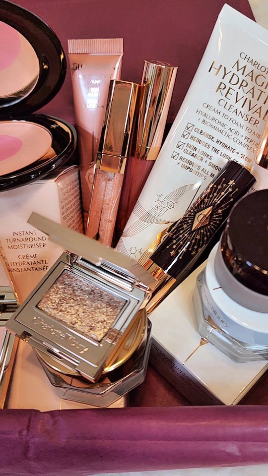 Instagram post by @beautybybev101 for Charlotte Tilbury. Caption reads: Unboxing magic from the queen of glow herself —....
