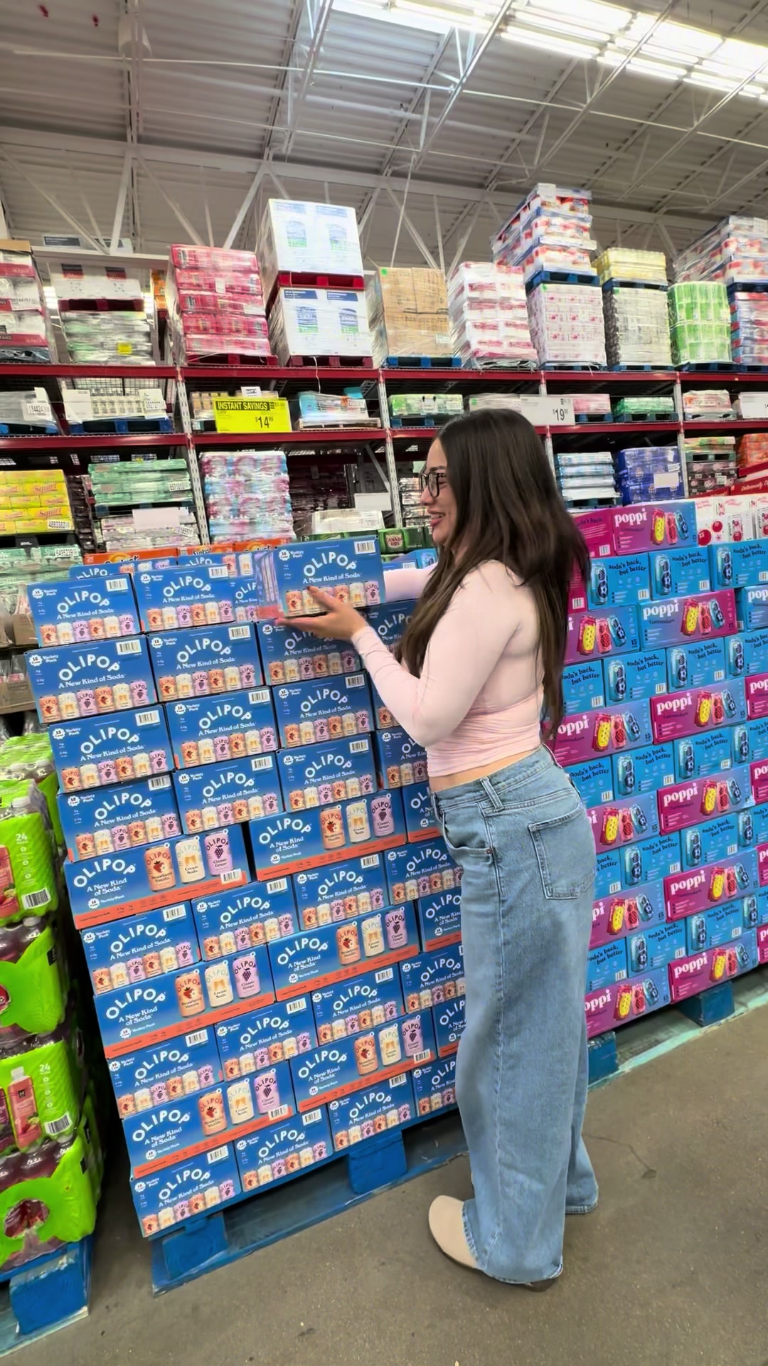 TikTok post by @andrea.arzola for OLIPOP. Caption reads: So ready to pair my holiday food with a cold....