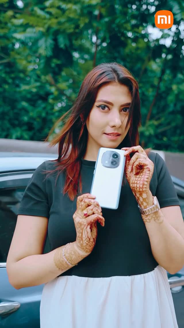 Instagram post by @falguniagarwal for Xiaomi India. Caption reads: Walked into the store to check the hype around the....