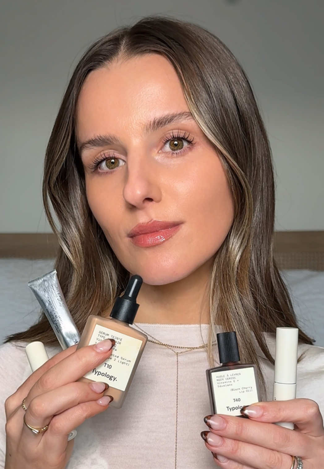 TikTok post by @juuujubee for Typology. Caption reads: A simple no-makeup look using all of my favorites....