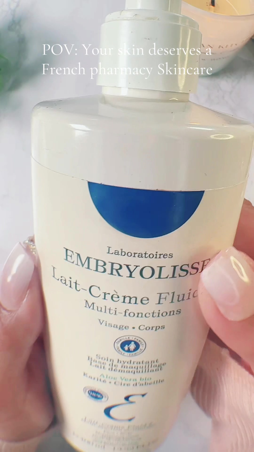 TikTok post by @geenabougieonabudget for Embryolisse USA. Caption reads: I’ve been reaching for the Embryolisse Lait-Crème....
