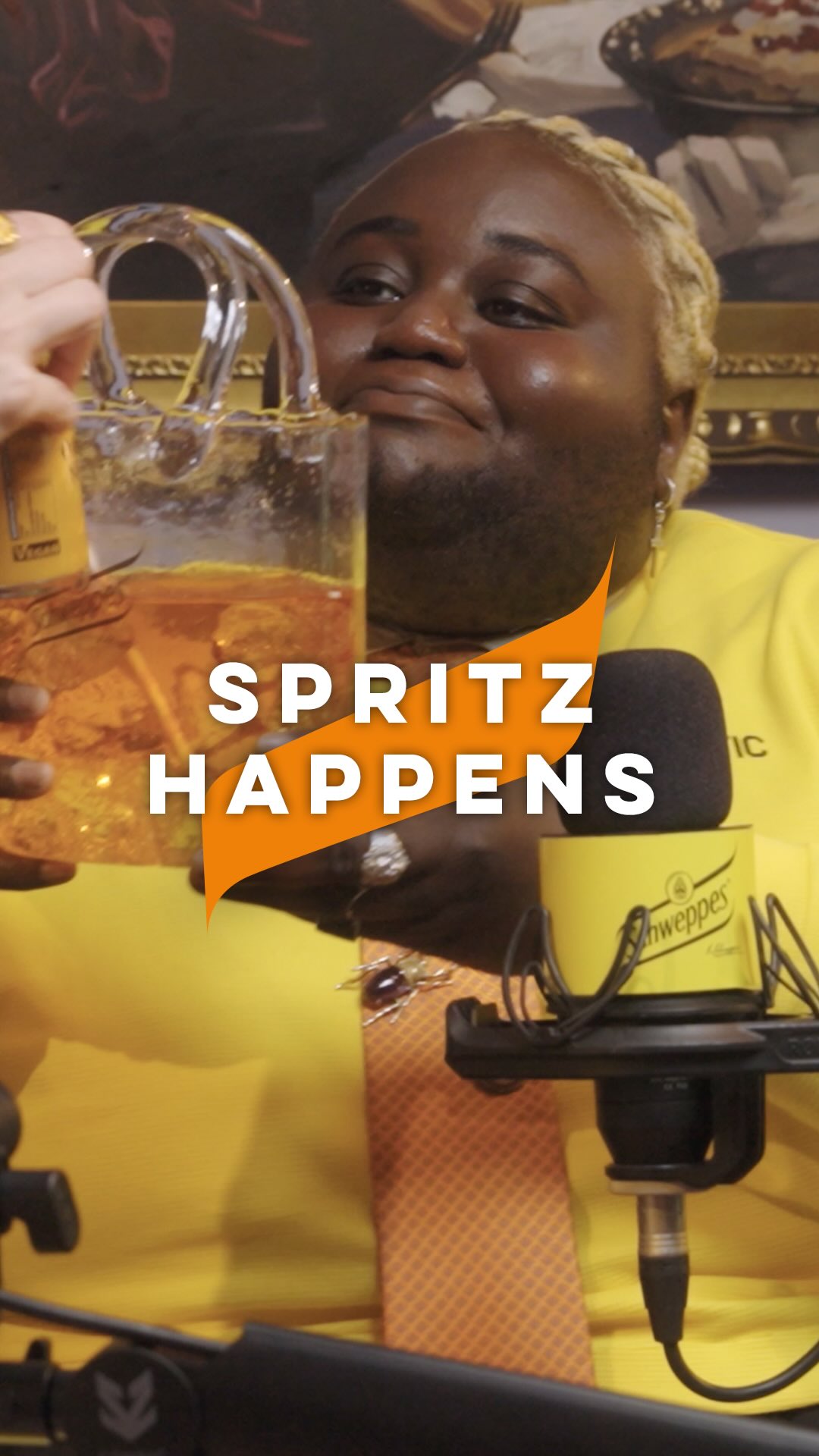 Instagram post by @richmond_rockson for Schweppes. Caption reads: Mode, Drama & mehr bei #SpritzHappens 🍊🎙️.