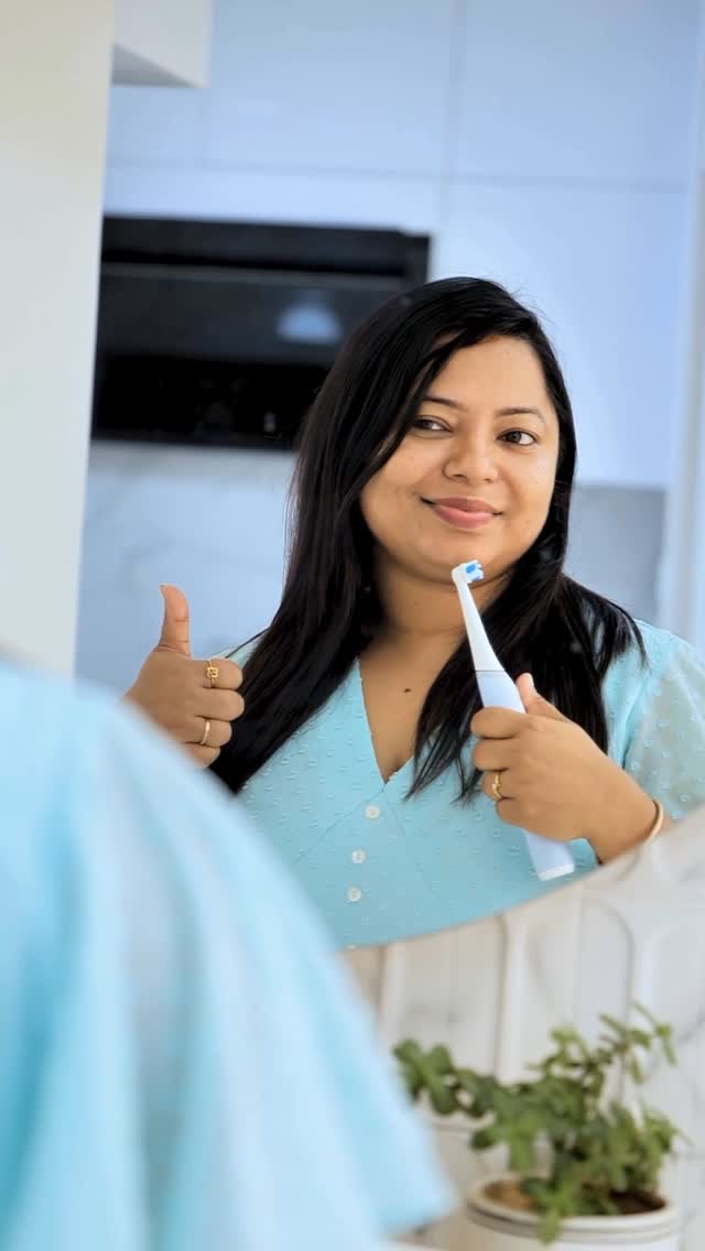 Instagram post by @iam_ankitamz for Oral-B. Caption reads: 🦷 Smart, sleek, and powerful — meet the Oral-B....