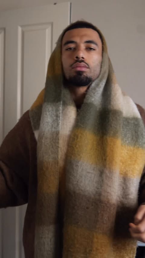 Instagram post by @mo.abdinn for Armani beauty. Caption reads: [...] needs a signature scent, my go to is....