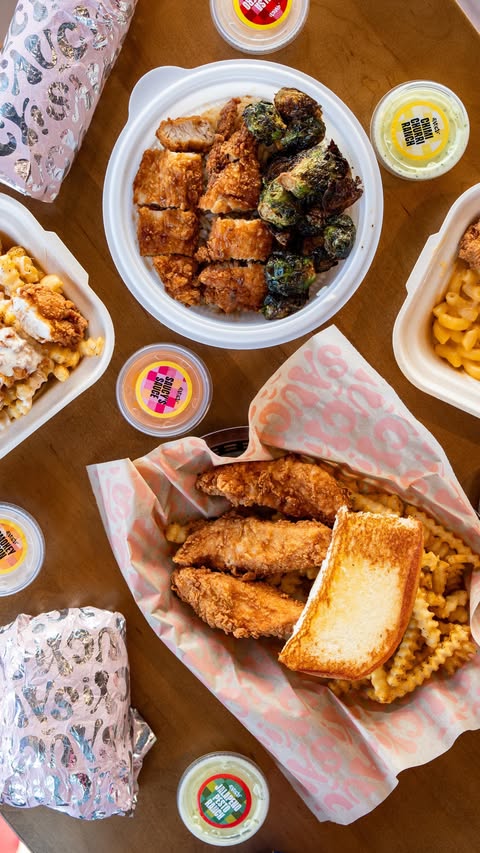 Instagram post by @somehowimeverywhere for Visit Orlando. Caption reads: Saucy! By KFC has expanded and opened new location....