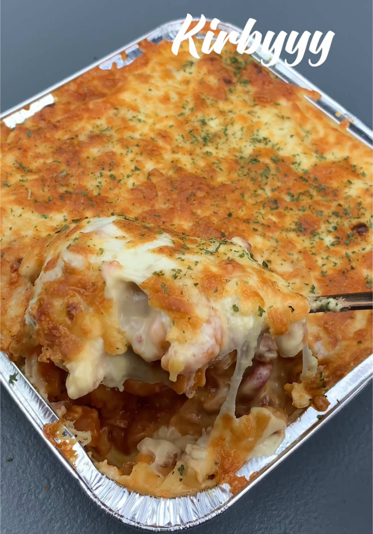 TikTok post by @kirbyquimado for Del Monte. Caption reads: Pure satisfaction 🤤✨  Creamy, cheesy Baked Mac -....