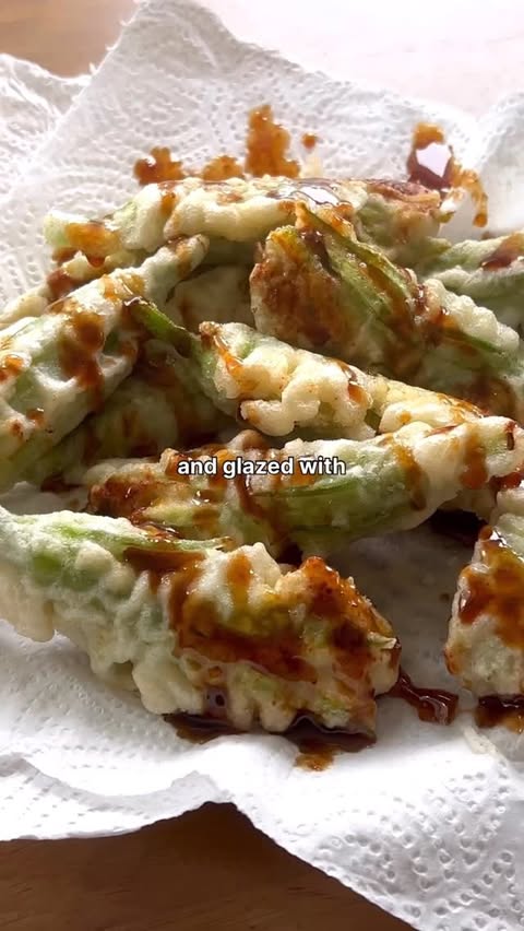 Instagram post by @kenjcooks for Bachan’s. Caption reads: fried squash blossoms @kenjcooks 

these tempura....