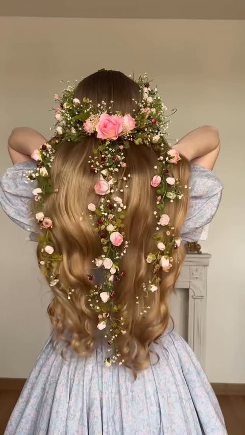 Instagram post by @jeanne.dordain for Selkie. Caption reads: [...] hairstyle with rose vines 🥀🪞Dress @selkie....