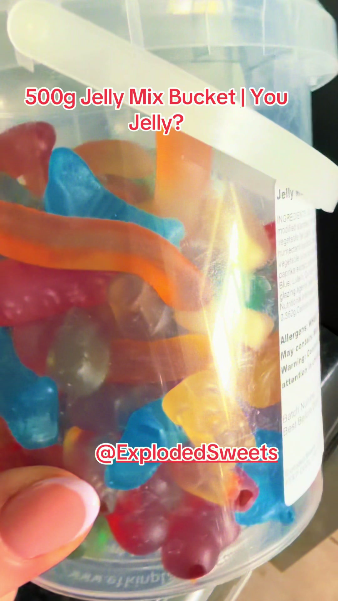 TikTok post by @emma_davies90 for Exploded Sweets. Caption reads: Sweet tooth kicking in? 🍬👀 This 500g Jelly Mix....