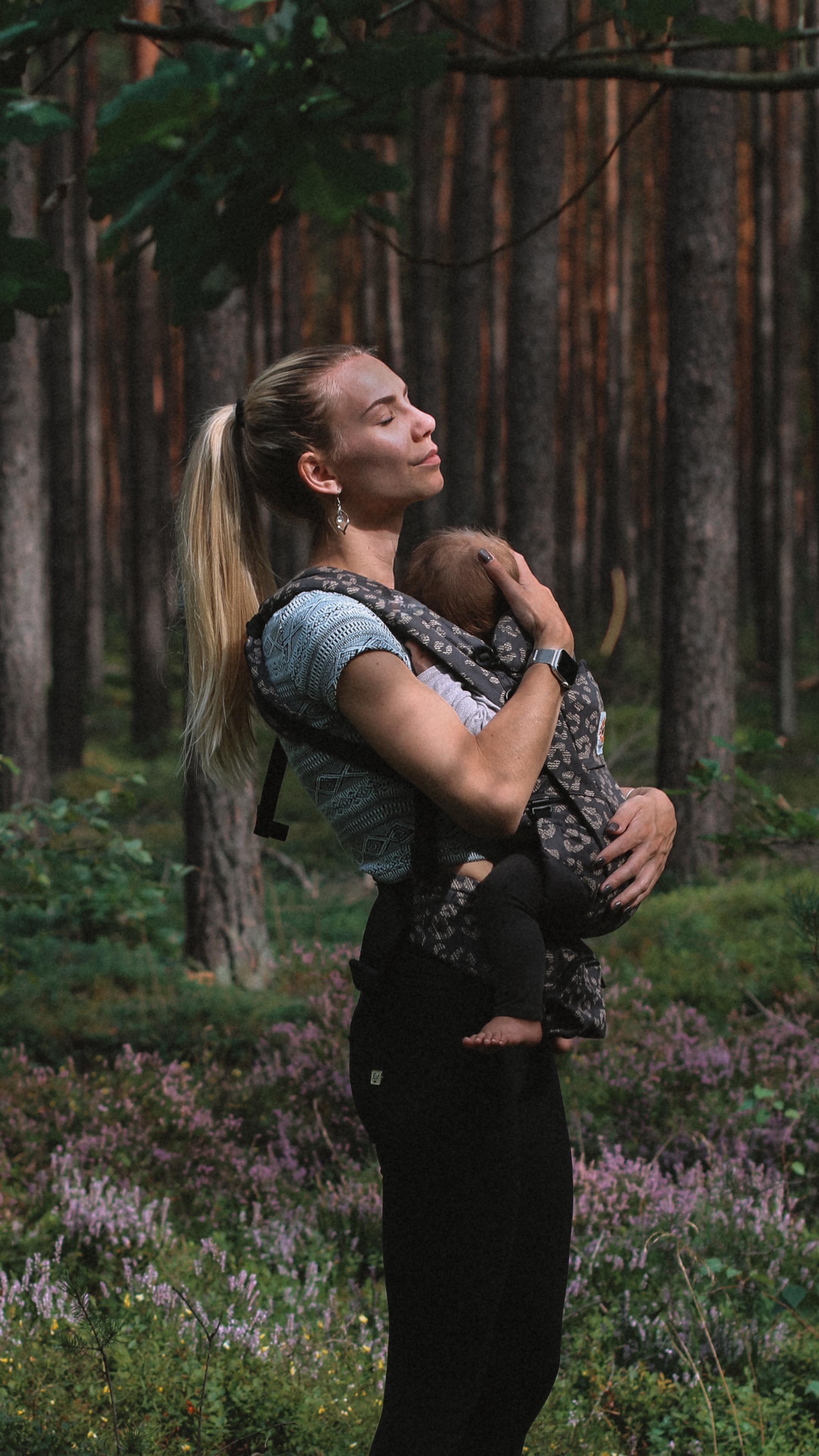 Instagram post by @wenckusch for Ergobaby. Caption reads: “The art of doing nothing and everything, all at....