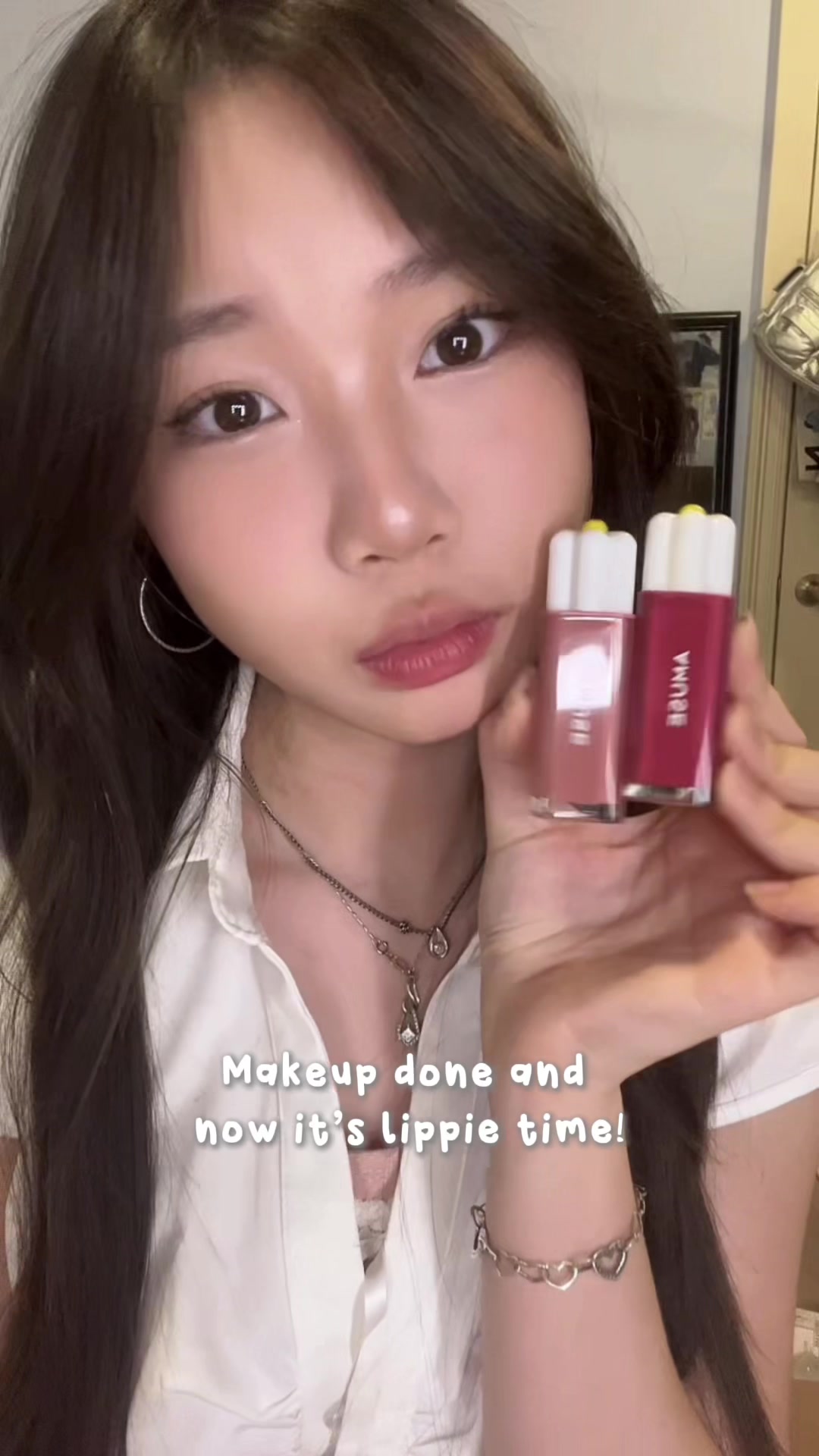 TikTok post by @phoe4ter for AMUSE Seoul. Caption reads: [...] Wonyoung’s AMUSE dew tint picks !💗 @AMUSE....