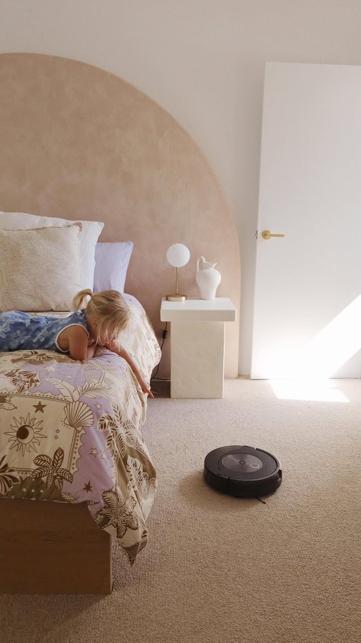 Instagram post by @kaylaaaellieee for iRobot. Caption reads: Life with a 2-year-old can be hectic, but thanks....