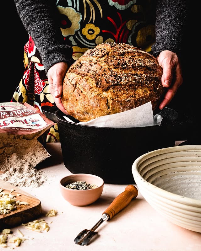 Instagram post by @kickassbaker for Bake from Scratch. Caption reads: This is the time to try your hand at baking bread.....