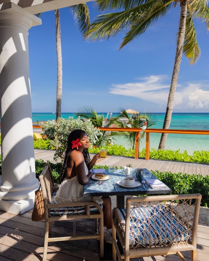 Instagram post by an influencer for Sandals Resorts. Caption reads: [...] head for awhile 🇯🇲🥥🌴🍹@sandalsresorts....