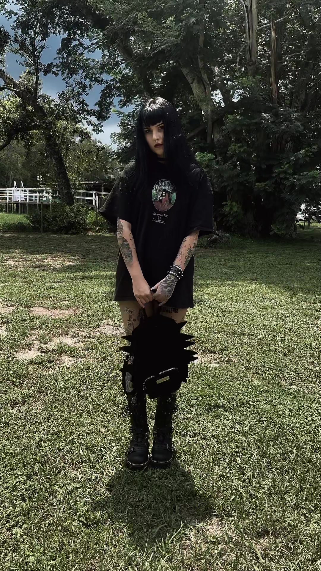 TikTok post by @mynamesgiorgi for Demonia Cult. Caption reads: Spiked backpack from @Demonia Cult just restocked....