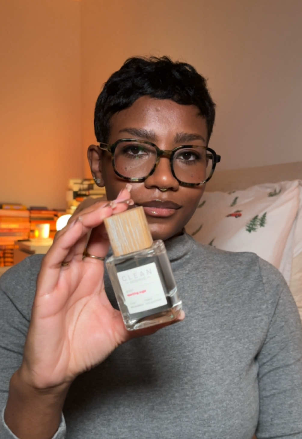 TikTok post by @farisaic for Clean Beauty. Caption reads: the perfect fresh gourmand fragrance Sparkling....