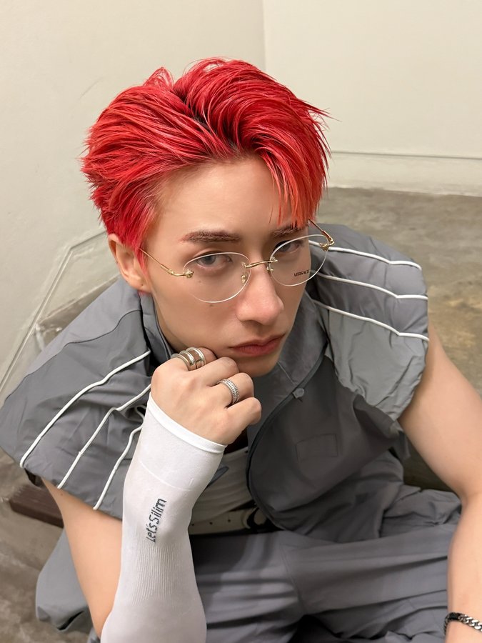 Instagram post by @jungwboo for EssilorLuxottica. Caption reads: Classic never goes out of style ✨

#versace....