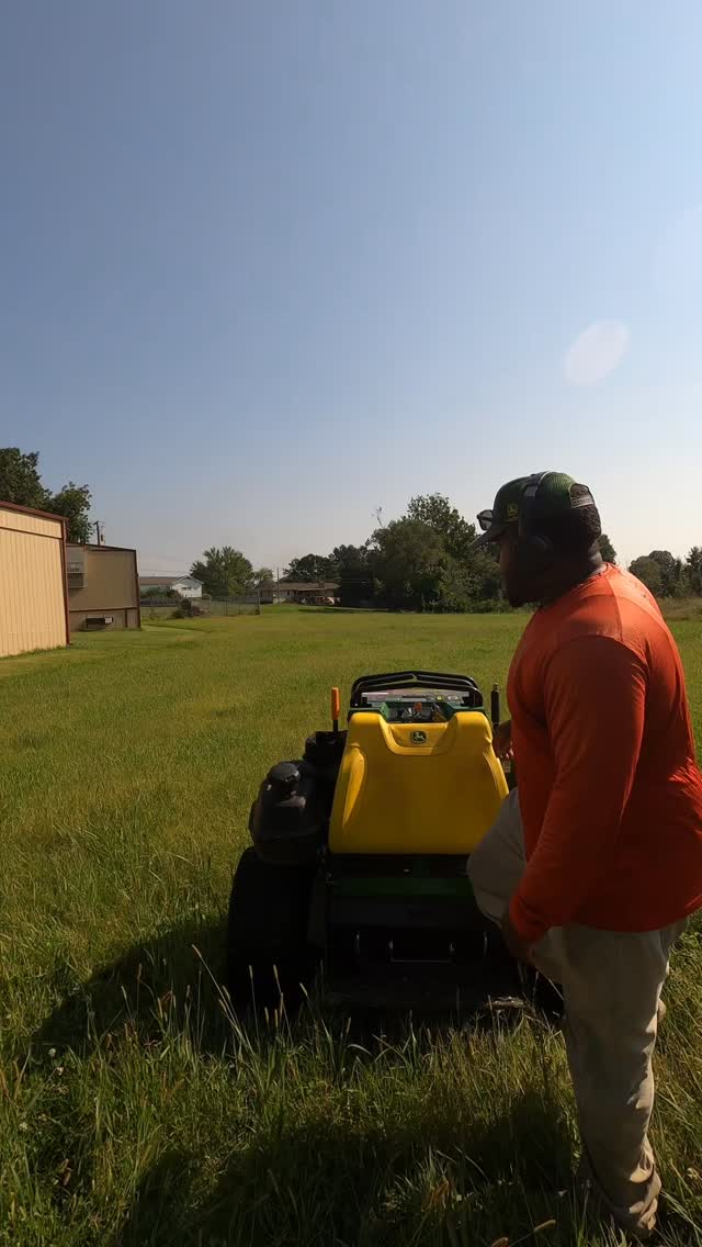 Instagram post by @powellslawncare for John Deere. Caption reads: We all have those bumpy yard on our route — well,....