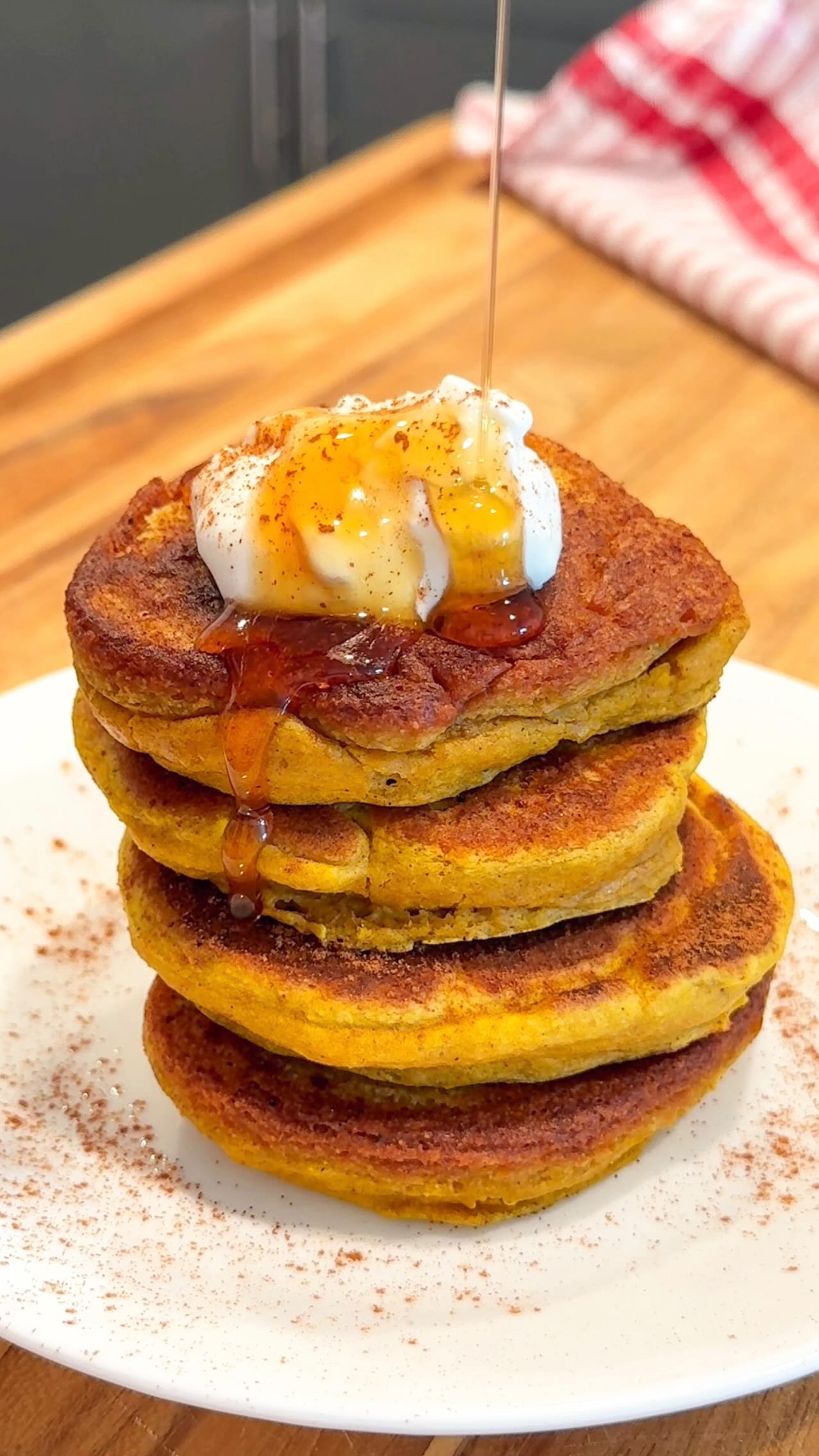 Instagram post by @glowingwithgracee for Stonyfield Organic. Caption reads: Protein Pumpkin Pancakes🥞🧡

#AD Visiting the....