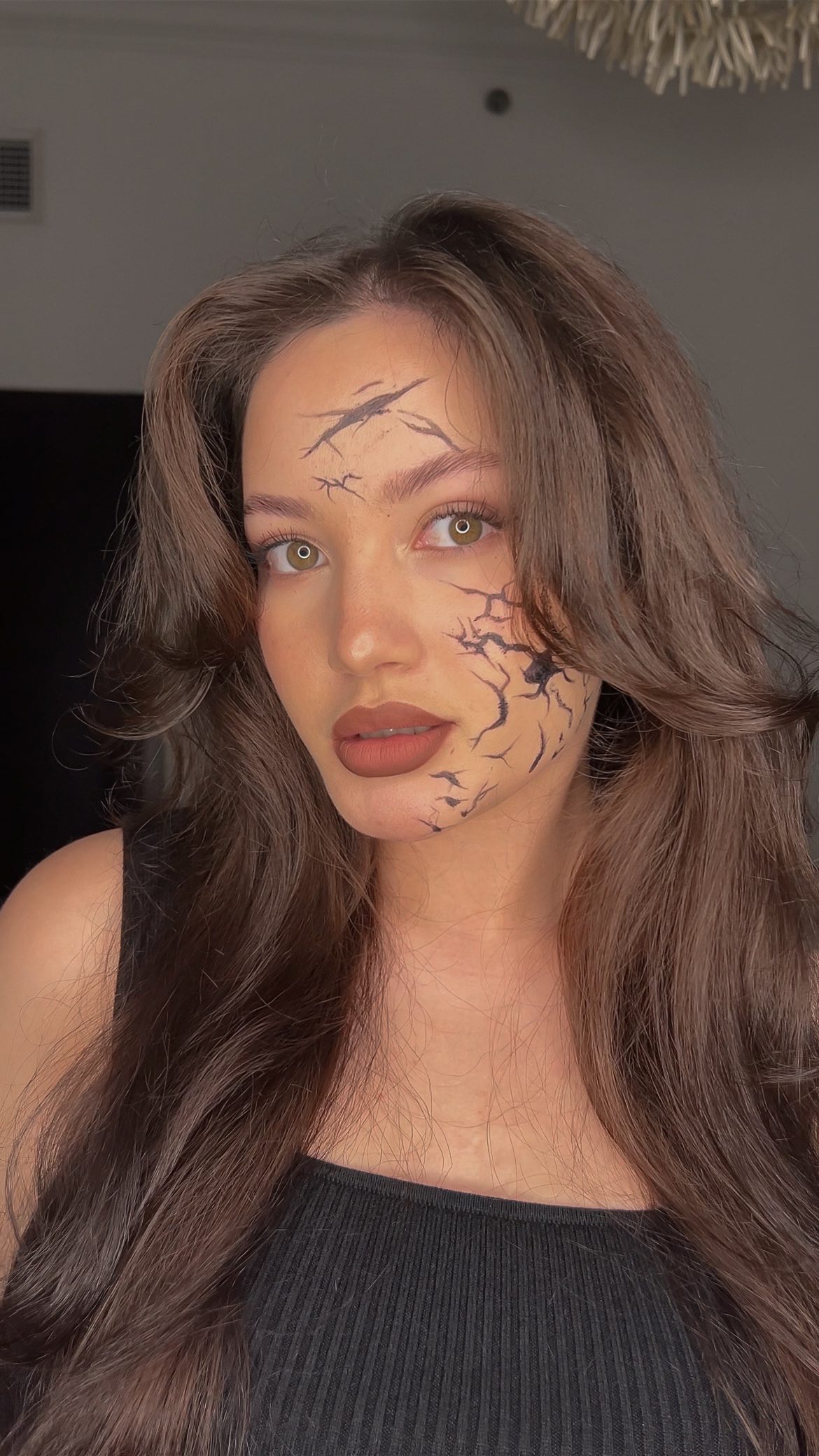 Instagram post by @caity_am for Essence Cosmetics. Caption reads: Received a last min invite to a Halloween Party?....