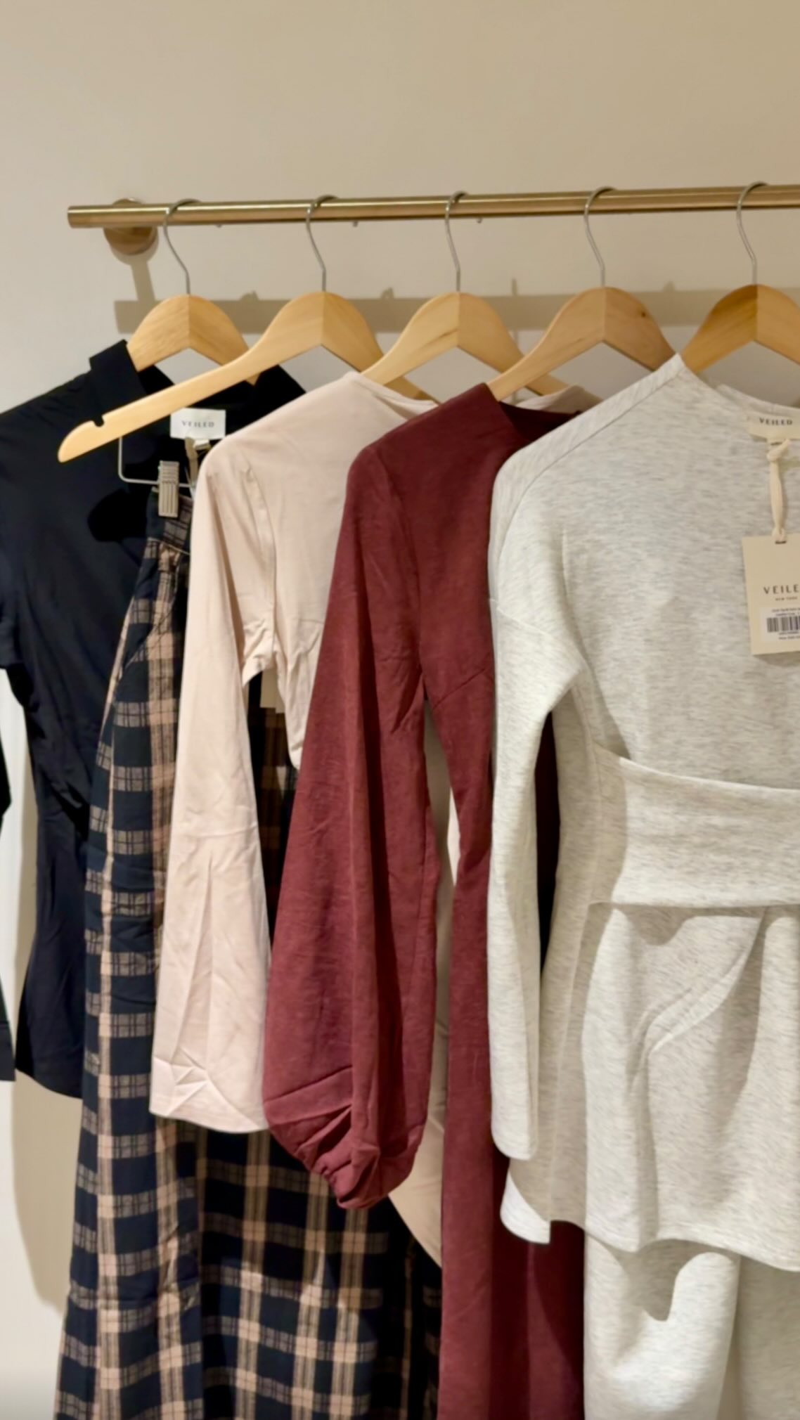 Instagram post by @bushra.kha.n for Veiled. Caption reads: had such a fun time shopping @veiledcollection new....