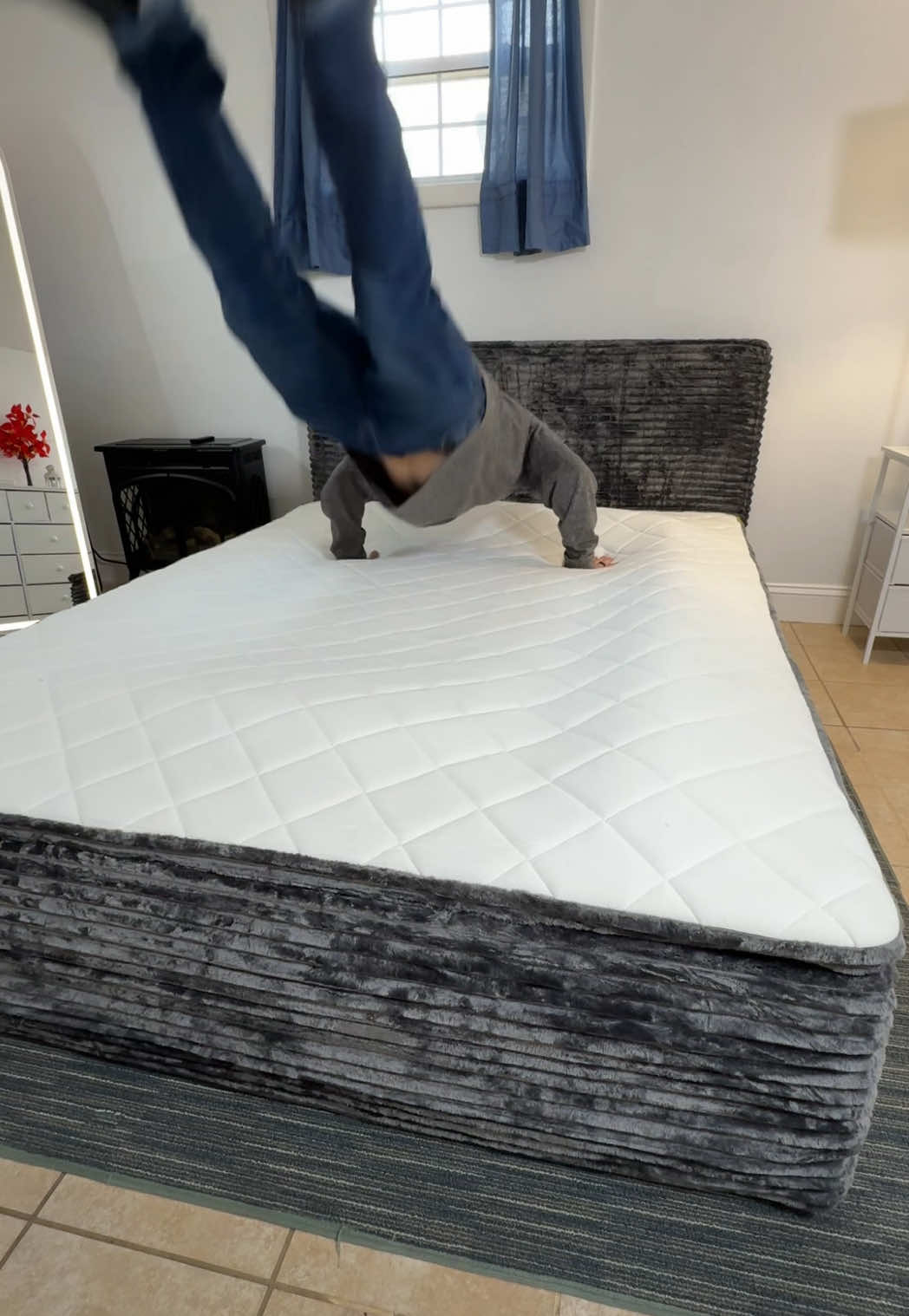 TikTok post by @jagotient for OVIOS OFFICIAL. Caption reads: No tools, no hassle, a boneless bed frame! @OVIOS....