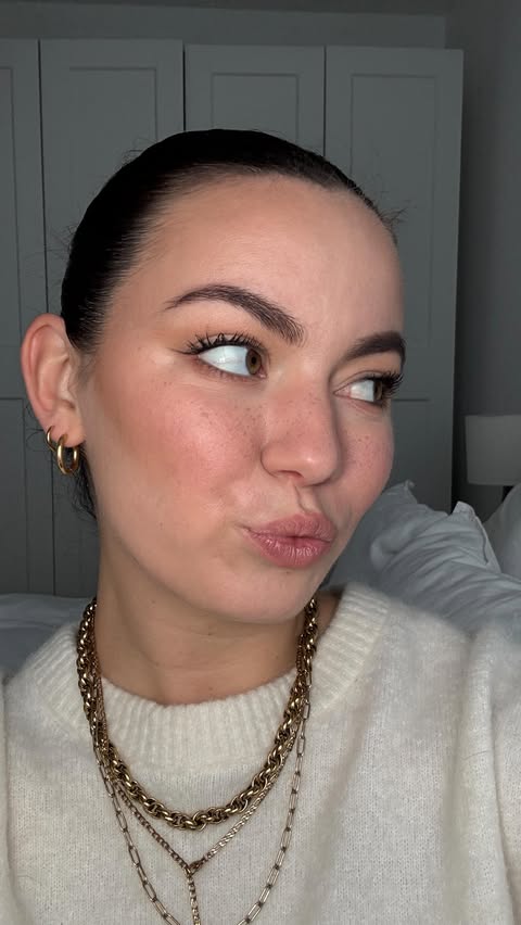 Instagram post by @alena.hnt for CAIA Cosmetics. Caption reads: festive make-up look with @caiacosmetics 🤍 / *Ad....