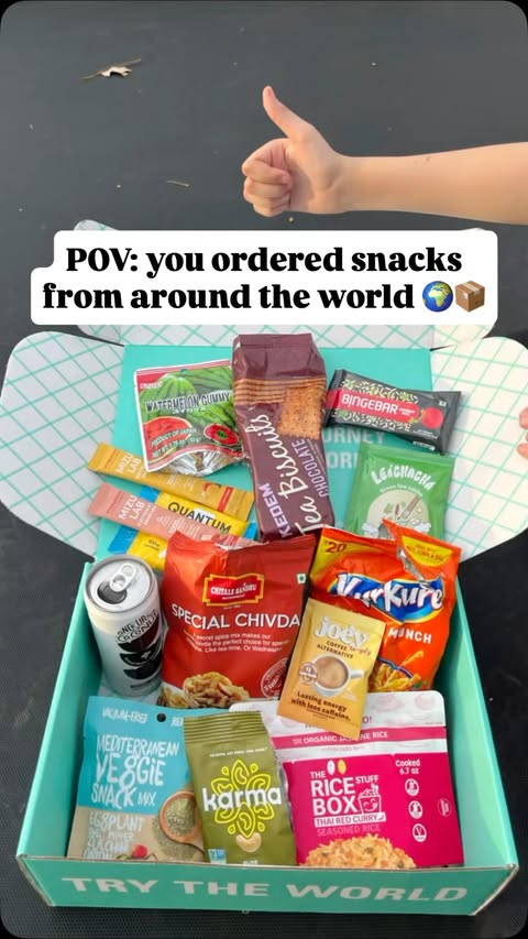 Instagram post by @thehomeasu for Try The World. Caption reads: [...] to snack your way around the world 😯....