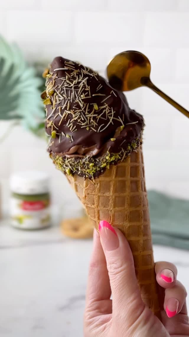 Instagram post by @sugarpusher for Amoretti. Caption reads: Trust me, you need this! 🍫💚....