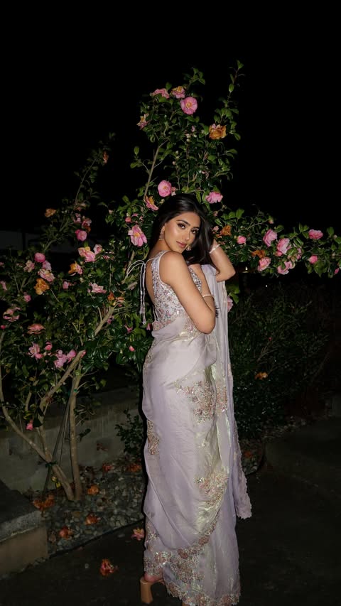 Instagram post by @simransandhu5 for LASHKARAA. Caption reads: Outfit from @lashkaraa #lashkaraa #collab #saree....