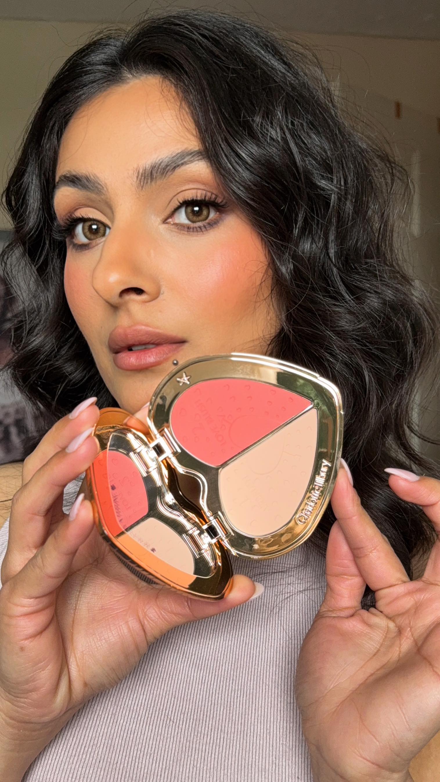 Instagram post by @iqraaqadirkhan for Selfridges. Caption reads: @charlottetilbury pillow talk collection is a....