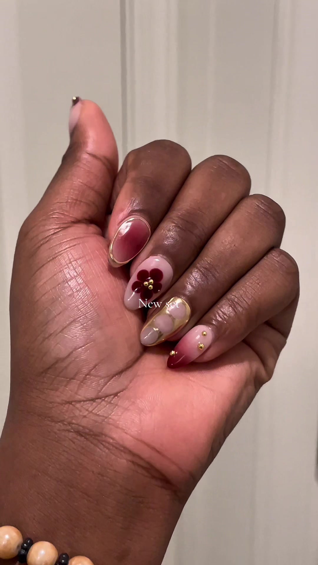 TikTok post by @joannee._ for Ersa Nails. Caption reads: New set💋 linked👆🏽 @Ersa Nails #tiktokshop....