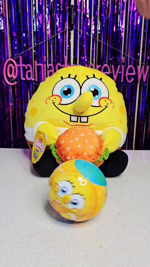 Instagram post by @tanjastoysreview for ZURU Toys. Caption reads: [AD] 💛Zuru Snackles SpongeBob SquarePants Large....