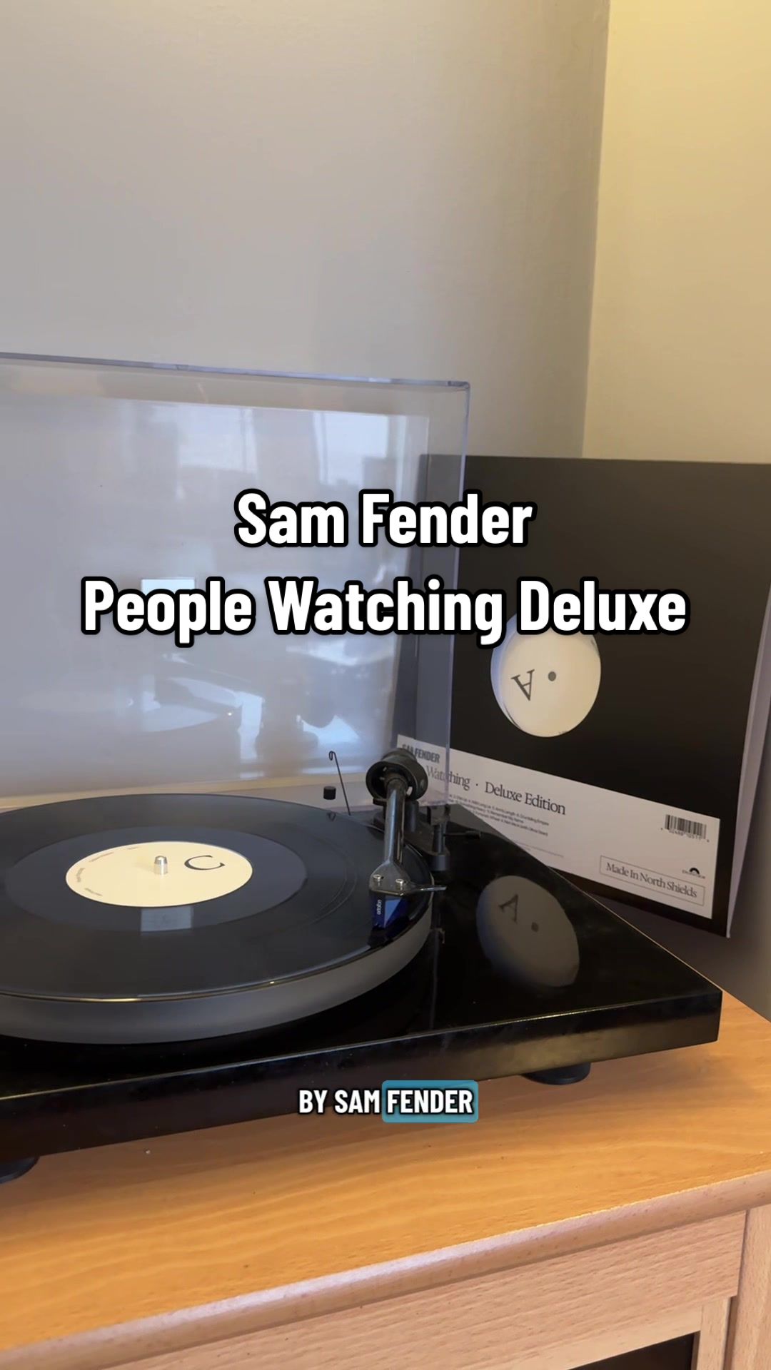 TikTok post by @atkins_sam for Universal Musiek. Caption reads: Vinyl unboxing of People Watching Deluxe by Sam....