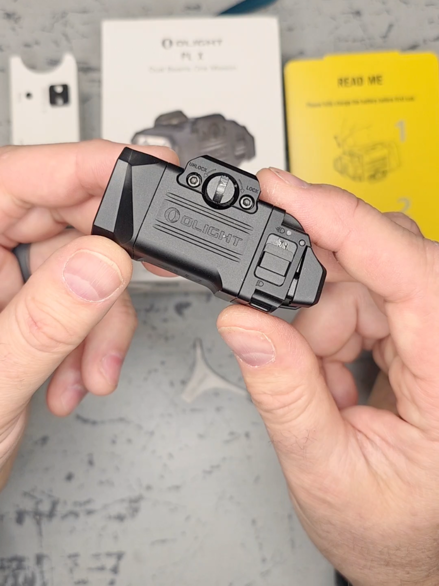 TikTok post by @hikerj for Olight. Caption reads: Olight Mountable Light thats a spot or flood [...].