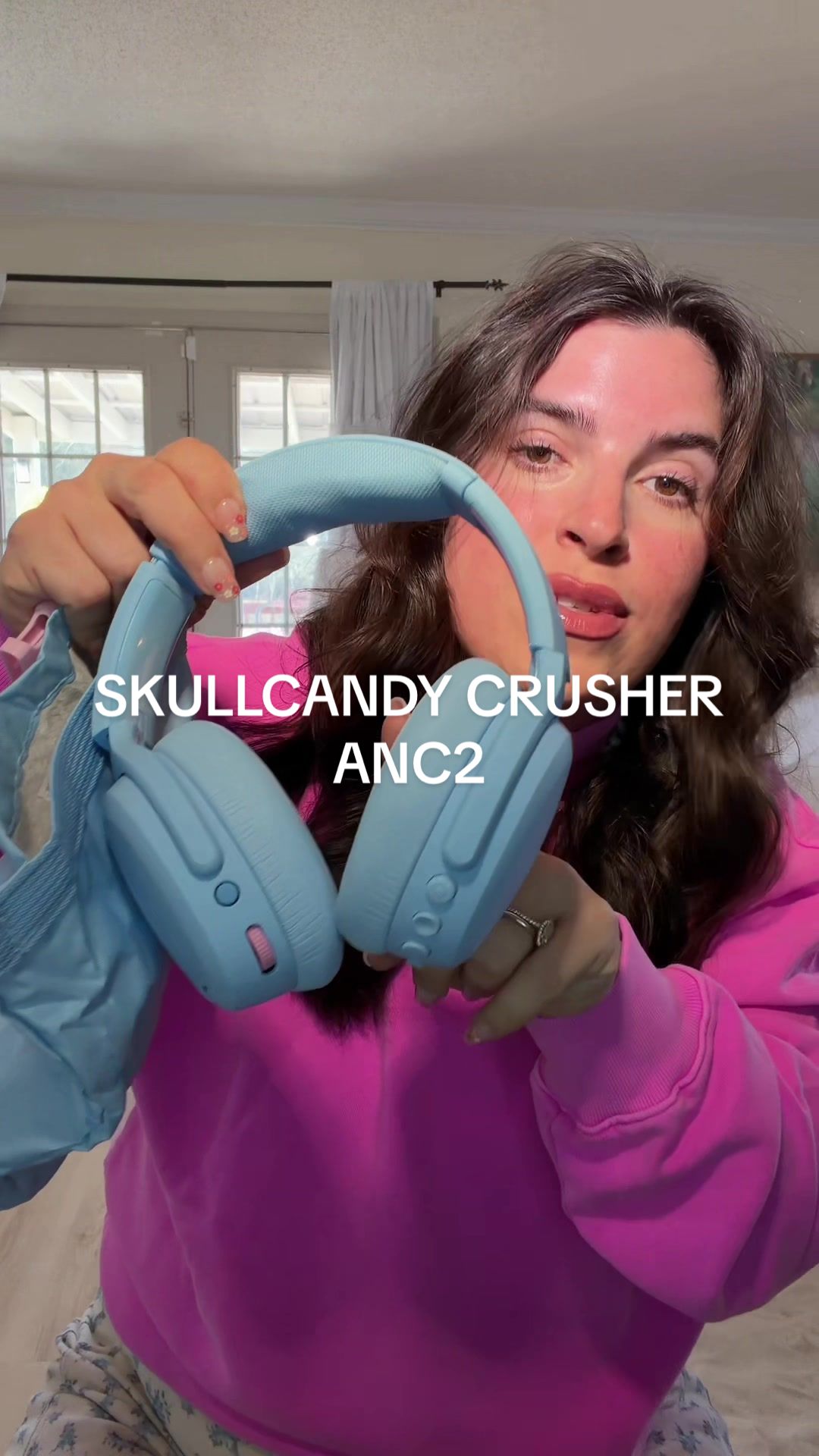 TikTok post by @chantlycaree for Skullcandy. Caption reads: [...] they are so spring 🦋☁️🌸@Skullcandy ....