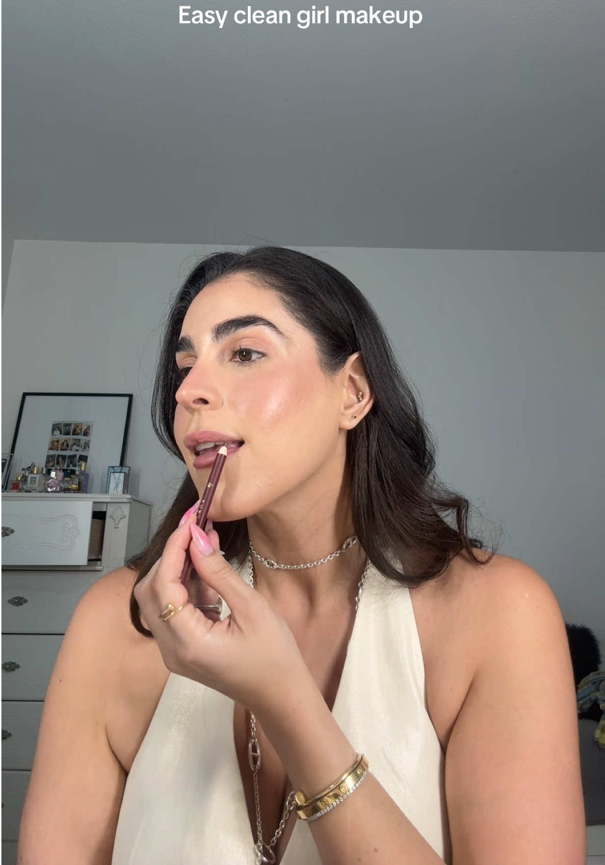 TikTok post by @elisamirandaxo for BK Beauty. Caption reads: [...] @Hourglass Cosmetics @L’Oréal Paris....