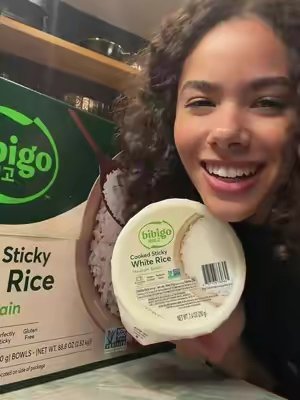 TikTok post by @antoniabgentry for bibigo USA. Caption reads: [...] #bibigoStickyRice #bulgogi @bibigo USA.