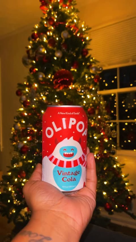 Instagram post by @chef_tweet for OLIPOP. Caption reads: Merry Christmas @drinkolipop #bestsoda #guttok....