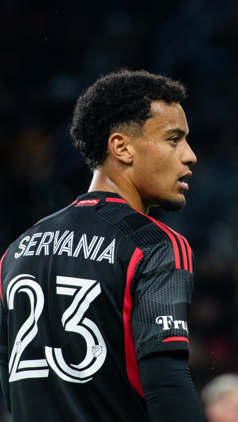 Instagram post by @brandonservania for Audi USA. Caption reads: Midfielder Brandon Servania hops in the passenger....