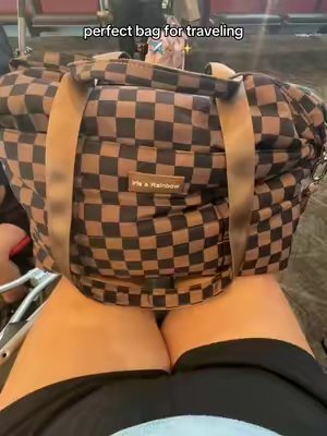 TikTok post by @jessicahomer3 for Iris And Rainbow. Caption reads: #irisandrainbow #totebag #travelbag #traveltiktok....
