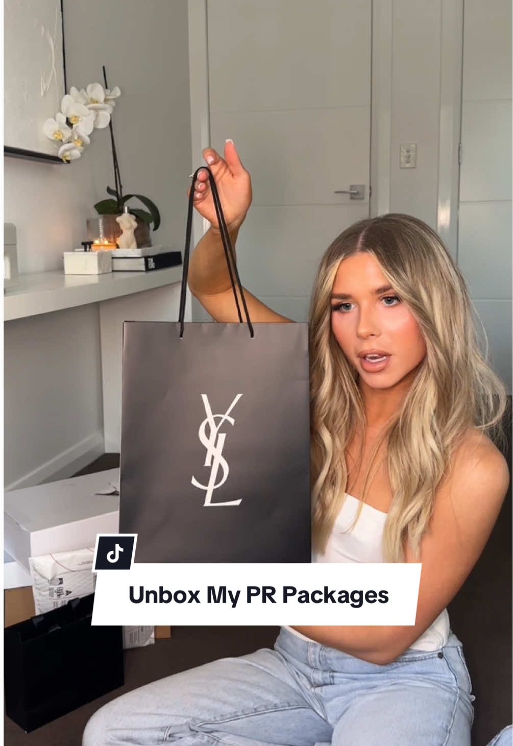 TikTok post by @mitch.greer for P.E Nation. Caption reads: [...] one of your faves, a PR Unboxing  @P.E....