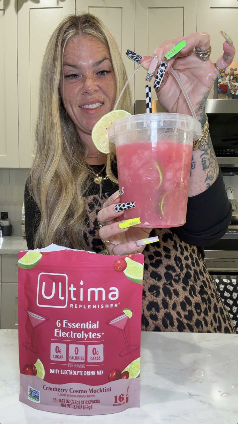 TikTok post by @itsmamacookie for Ultima Replenisher. Caption reads: Let’s make a drink 🖤 My favorite @Ultima....