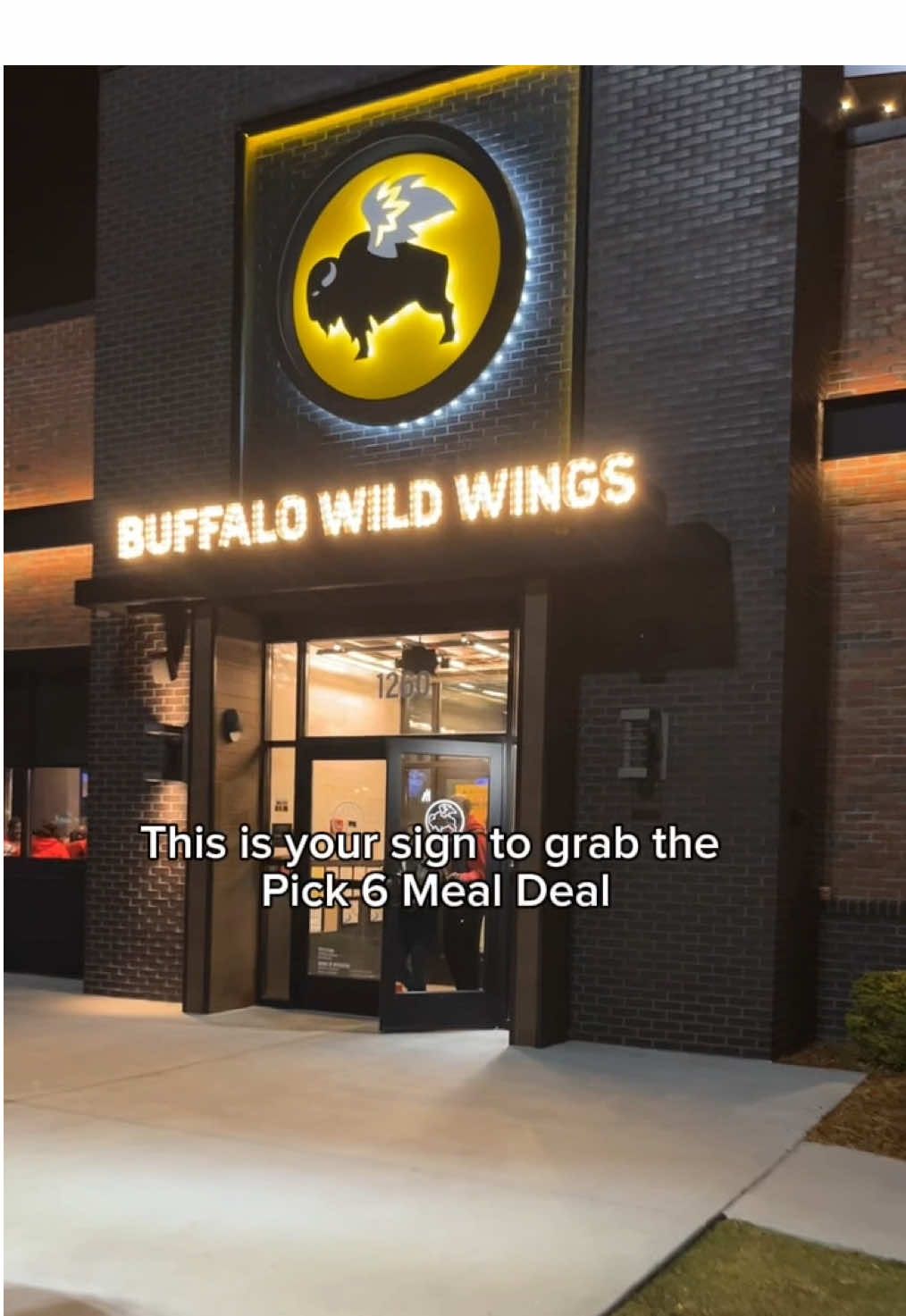 TikTok post by @thymewithtyler for Buffalo Wild Wings. Caption reads: Pick 6 anyone?? @Buffalo Wild Wings ....