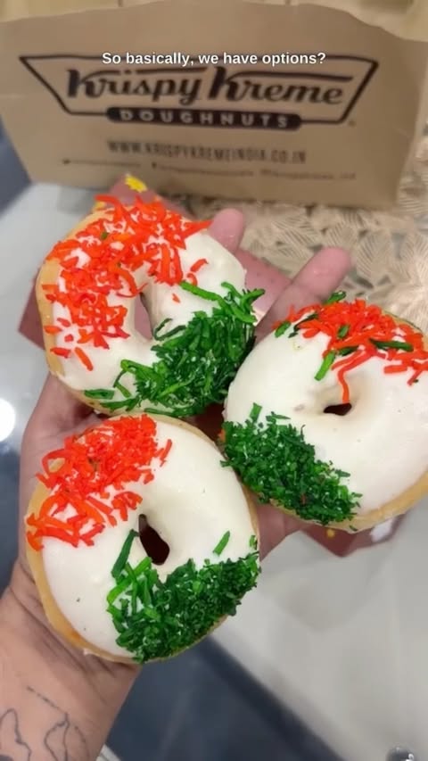 Instagram post by @bhukkad_dilli_ke for Krispy Kreme Doughnuts. Caption reads: The best celebrations are the ones you share.....