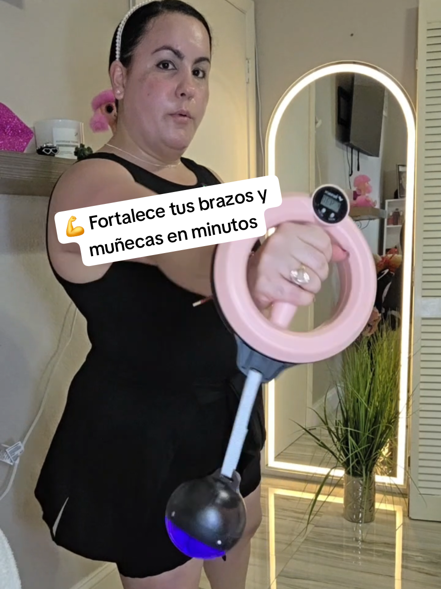 TikTok post by @yelena325 for Merach Fitness. Caption reads: [...] #ForearmWorkout #GripStrength @Merach....